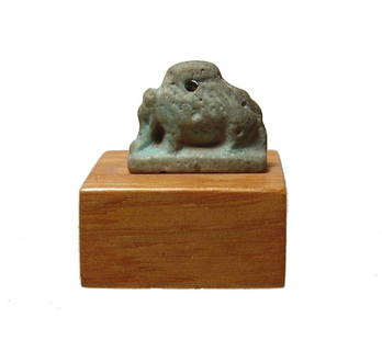 A nice Egyptian blue glazed faience amulet of a sow: A nice Egyptian blue glazed faience amulet of a sow, Late Period, c. 664 - 30 BC, with good detail and mounted on a neat custom base. L: 17 mm. Ex collection of J.D.R. Fryer, UK.