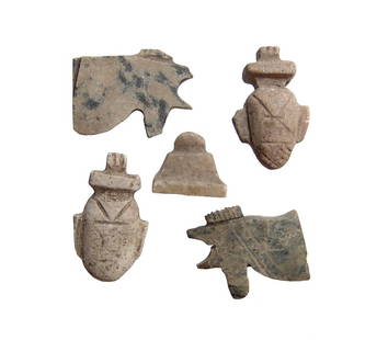 A lot of 5 Egyptian stone amulets, Late Period: A lot of 5 Egyptian stone amulets, Late Period, c. 664 - 30 BC, and include a pair of Eye of Horus amulets, a pair of choice ib or heart amulets, and an amulet of the Ben-Ben stone. Largest 27 x 15