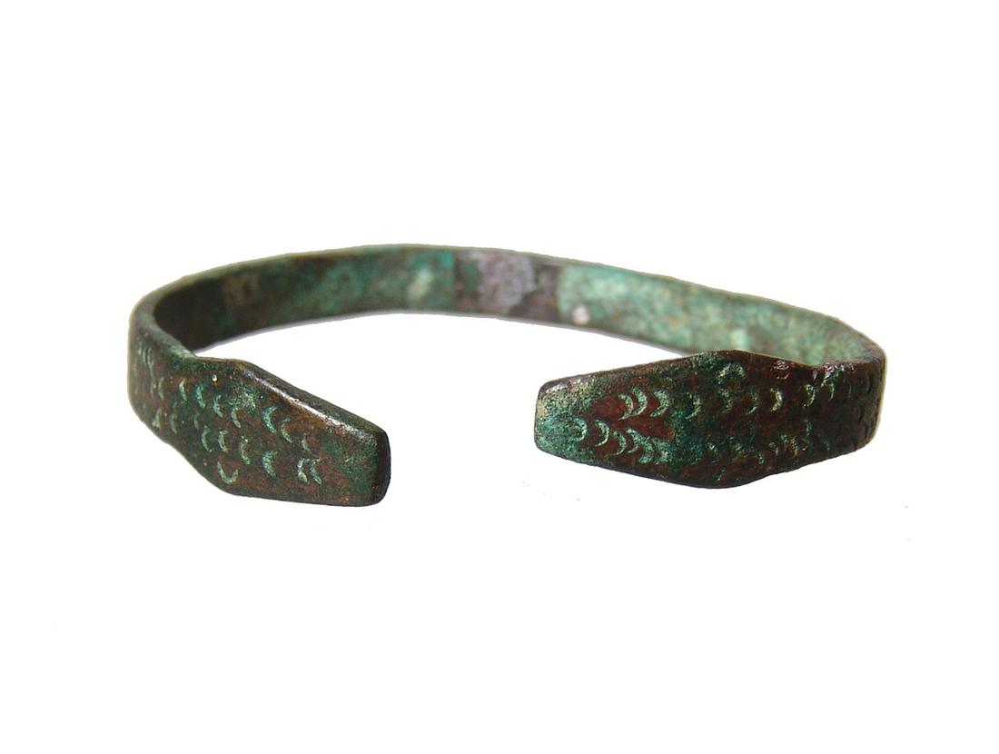 An attractive Near Eastern bronze snake bracelet (1 of 3)