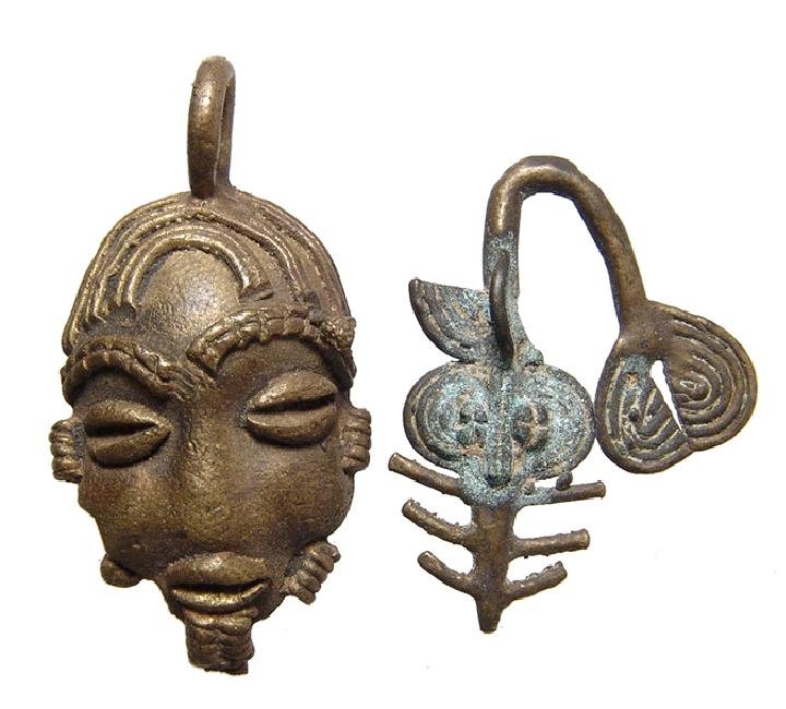 A pair of Ashanti brass weights for weighing gold (1 of 2)