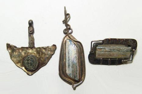 3 jewelry items: Glass earrings and coin pendant: A lot of 3 jewelry items, including 2 earrings comprised of ancient Roman glass and an ancient coin set in a pendant. Each is attractive and wearable, the coin dating from the late 4th Century AD.