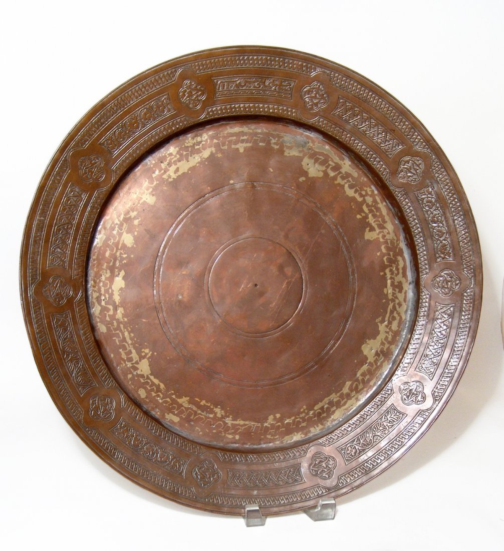 A large and deep tinned-copper food bowl, Levante: A large and deep tinned-copper food bowl, Levante, signed and dated AH 1108 (c. 1696/7 CE), with additional inscriptions on the body itself which include the owner’s name (Khoury) and a blessing for