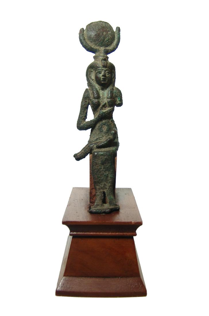 A well-detailed Egyptian bronze figure of Isis: A well-detailed Egyptian bronze figure of Isis, Late Period, c. 664 - 332 BC, depicted in traditional form seated. suckling the child Horus who sits on her lap. She wears a close-fitting gown, full wi