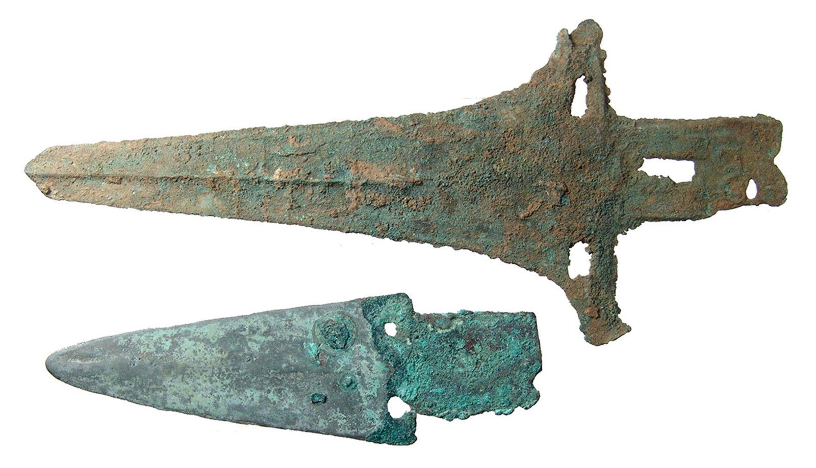 A pair of Chinese bronze daggers: A pair of Chinese bronze daggers. The first is a pole-mounted dagger of Zhou type but a later example c. 400 BC, L: 8 2/3 in (9.5 cm), the second a dagger blade from a similar period with attractive p