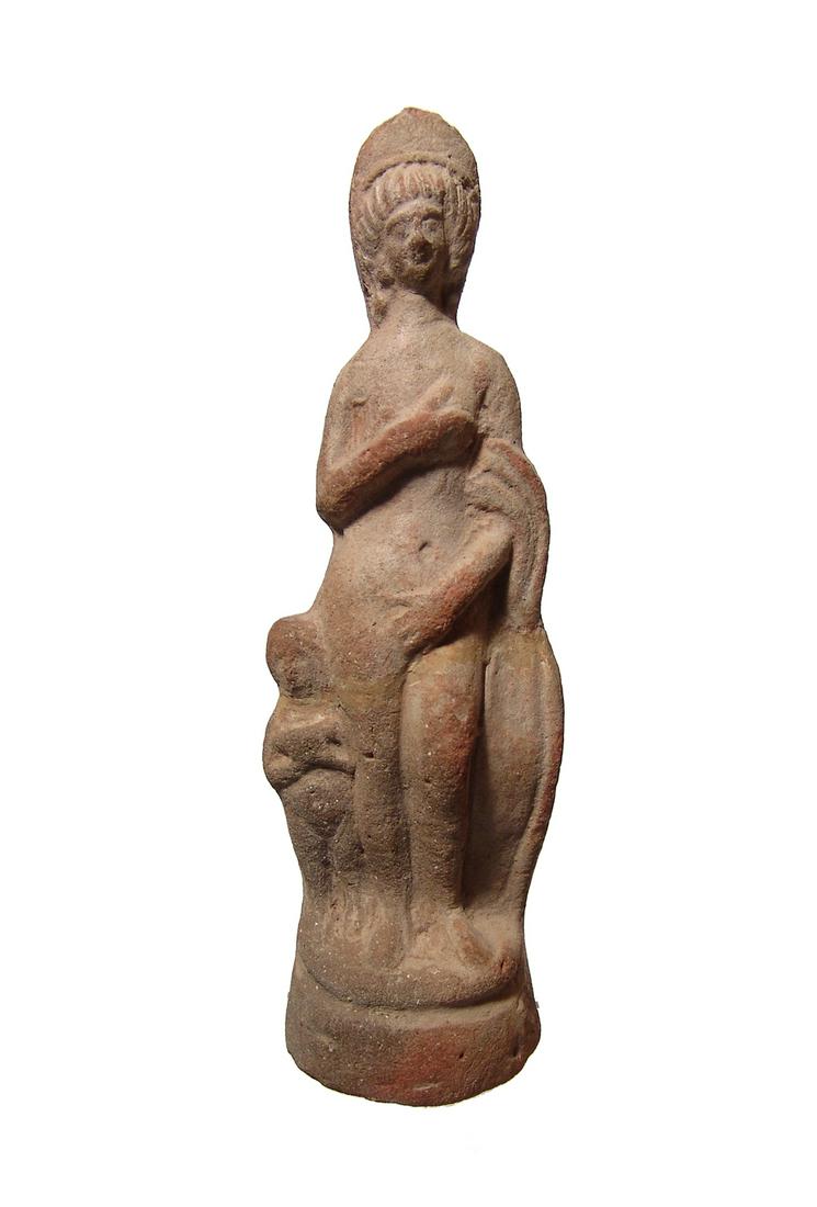 A lovely Roman terracotta figure of Venus Pudica: A lovely Roman terracotta figure of Venus Pudica, early 3rd Century AD, or the Modest Venus, depicted nude wearing a diadem, her hands covering her private areas, light drapery hangs from her left arm