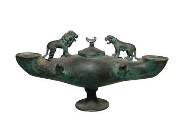 A large Byzantine double-spouted bronze lamp