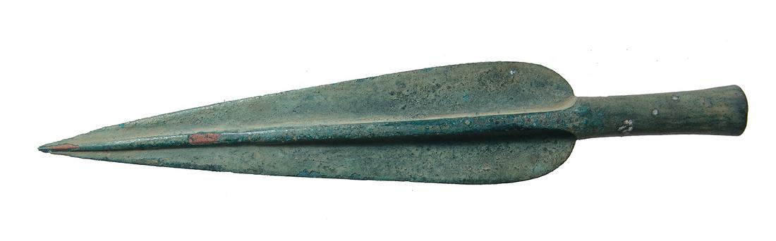Reproduction of a classic Greek bronze spear head: A reproduction of a classic Greek bronze spear head copying the style of c. 5th - 3rd Century BC, with heavy midrib, rounded shoulders and tapering blade. L: 7 5/8 in (19.4 cm). Nice olive-green patin