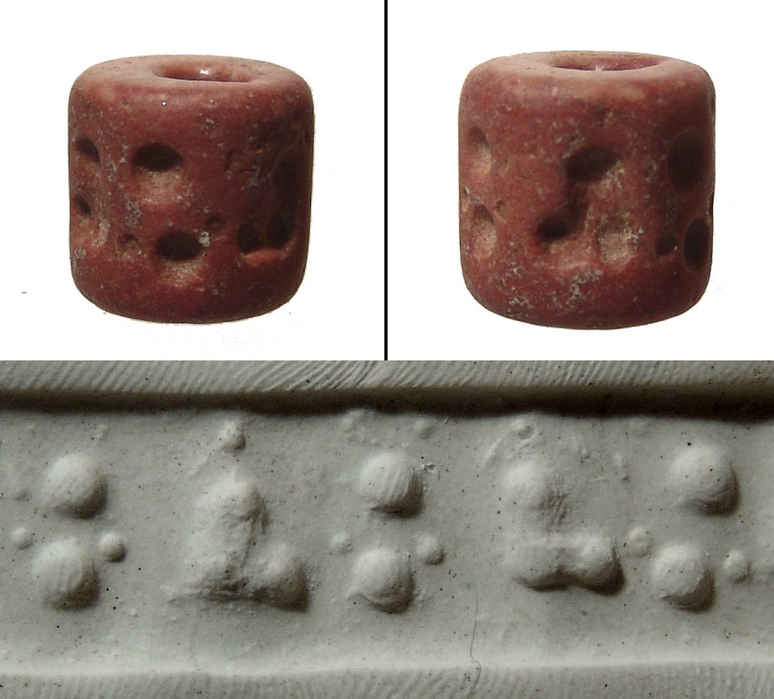 A nice red marble Sumerian cylinder seal, Jemdat Nasr: A nice red marble Sumerian cylinder seal, Jemdat Nasr, c. 3200 - 2900 BC, featuring stylized seated figures comprised of circular drilled depressions. 16 x 16 mm. Hole with heavy wear to one side from