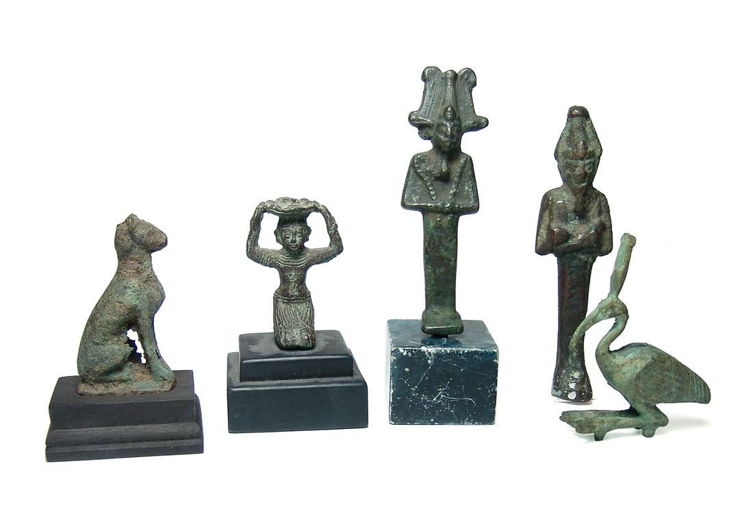 A lot of 5 Egyptian-style bronze objects, c. 20th: A lot of 5 Egyptian-style bronze objects, c. 20th Century. A nice group of display pieces including a pair of Osiris figures, a kneeling woman with plate atop her head, a nicely detailed ibis and a fi