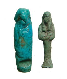 Egyptian faience ushabti and modern companion: An Egyptian faience ushabti and a modern companion. The first is crude blue faience ushabti, Late Period, c. 664 - 30 BC, with nice color. The second is a modern little ushabti with green color. Large