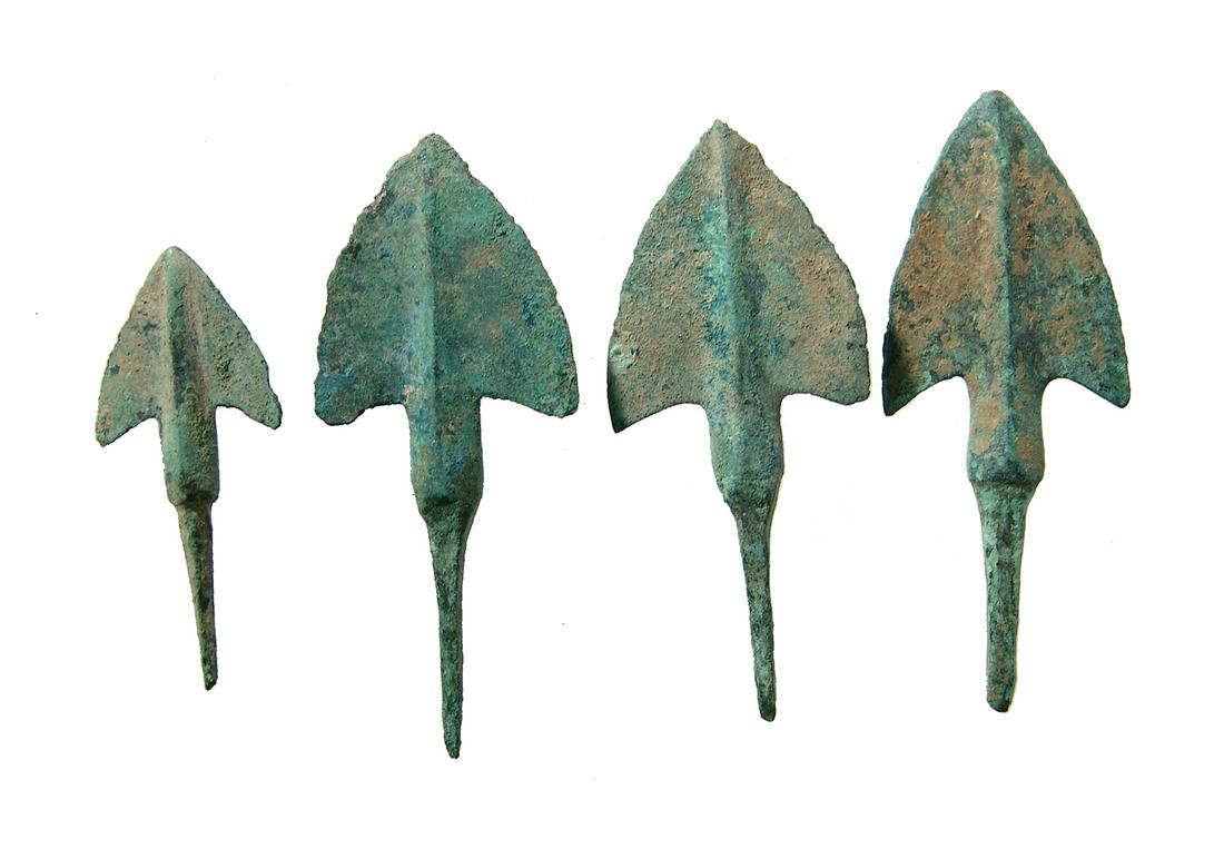 A group of 4 Near Eastern bronze arrow points (1 of 2)