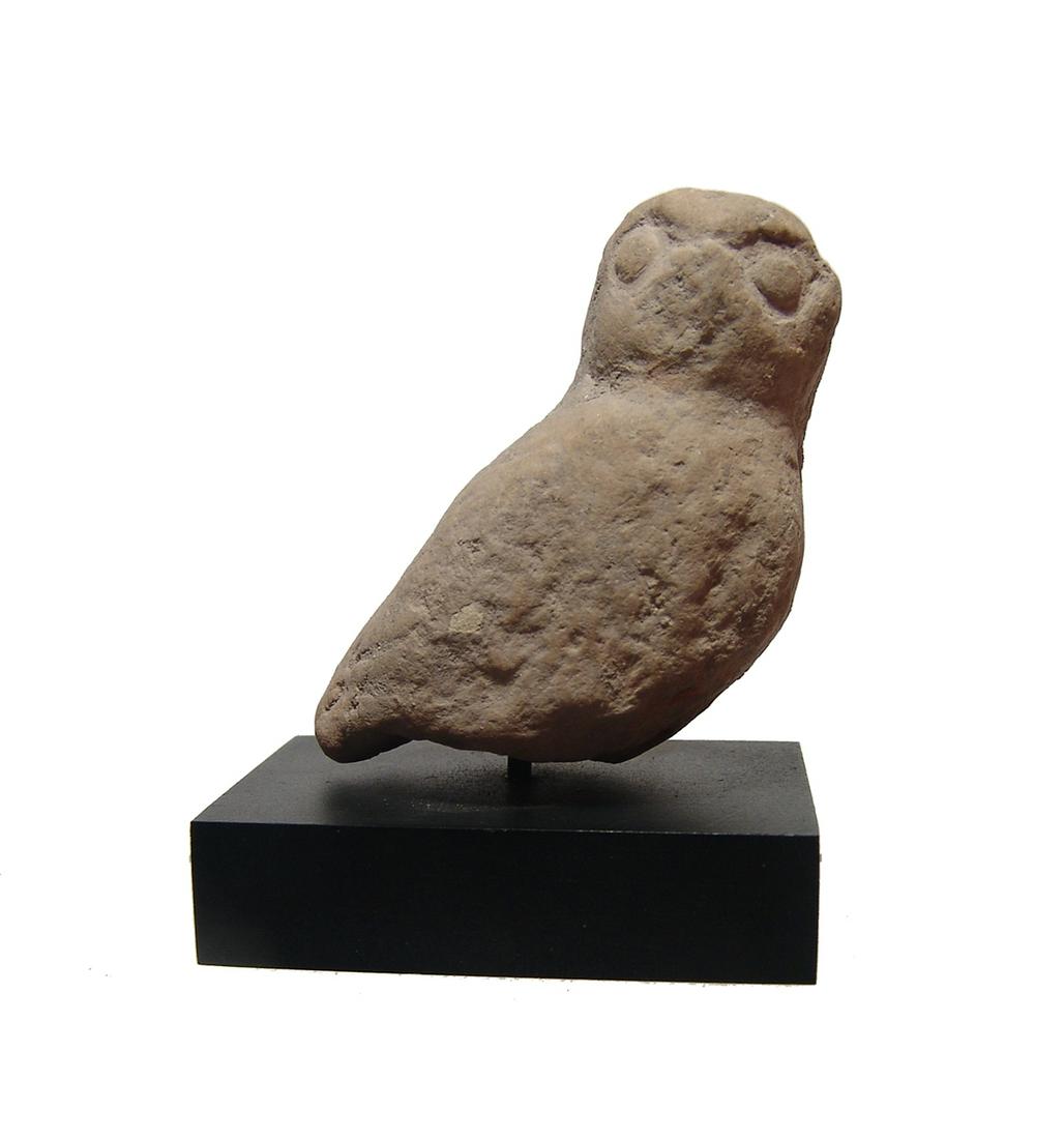 A rare Hellenistic terracotta figurine of an owl (1 of 3)