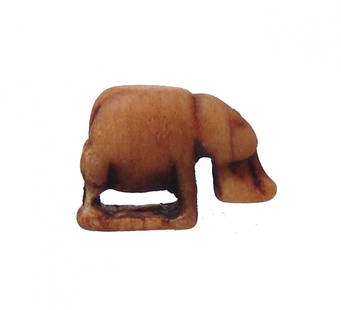 A Romano-Egyptian calcite amulet of a hippopotamus: A Romano-Egyptian calcite amulet of a hippopotamus, c. 1st - 3rd Century AD, in naturalistic style and on integral base/ L: 1.9 cm. Resin deposits. Ex Hoy collection, Ontario, acquired from Aton