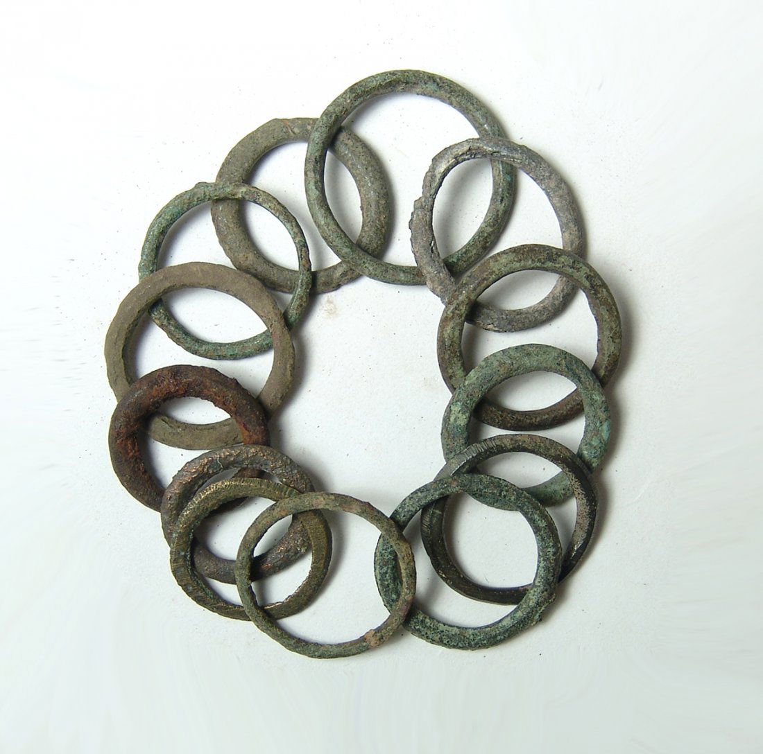 A lot of 12 bronze currency rings, Western Europe (1 of 1)