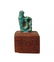 An Egyptian faience amulet of a cobra, Late Period