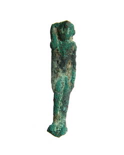 An Egyptian bronze seated amulet of Harpokrates: An Egyptian bronze seated amulet of Harpokrates, Late Period, c. 664 - 332 BC, depicted seated wearing side lock of youth and uraeus, hands on lap and suspension loop at back of neck. H: 2 1/8 in