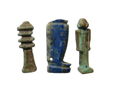 A group of 3 Egyptian stone and faience amulets: A group of 3 Egyptian stone and faience amulets, Late Period, c. 664 - 30 BC, including a green faience Djed pillar, a green faience amulet of Khnum, and lower half of a Lapis Lazuli amulet. Largest