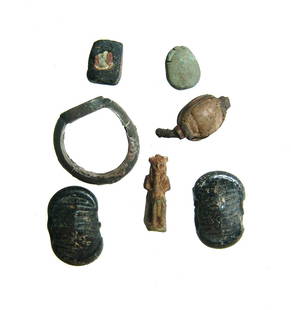 An interesting collection of ancient items: An interesting collection of ancient items. Lot includes a pair of Egyptian scarabs, Late Period - Ptolemaic, c. 664 - 30 BC, one set in a silver and iron ring bezel, an Egyptian faience amulet of