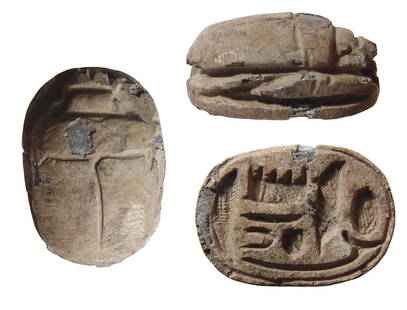 A nice Egyptian steatite scarab, Late New Kingdom: A nice Egyptian steatite scarab, Late New Kingdom, c. 1296 - 1075 BC, the body and legs nicely carved. On base a blessing from Amen-Re with a lovely blossom beneath. 16 x 11.5 mm. Holed lengthwise