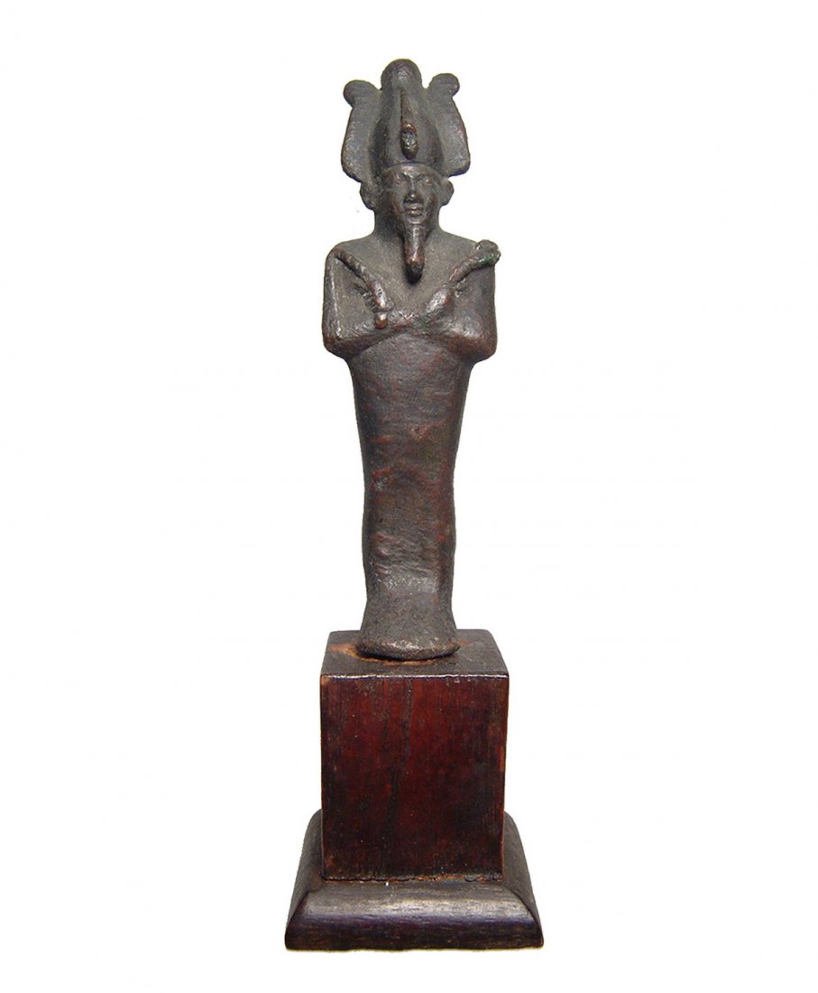 A nice Egyptian bronze figure of Osiris, Late Period: A nice Egyptian bronze figure of Osiris, Late Period, 26th Dynasty c. 664 - 525 BC, depicted mummiform wearing Atef crown with uraeus and false beard, arms crossed over chest, hands grasping a crook a