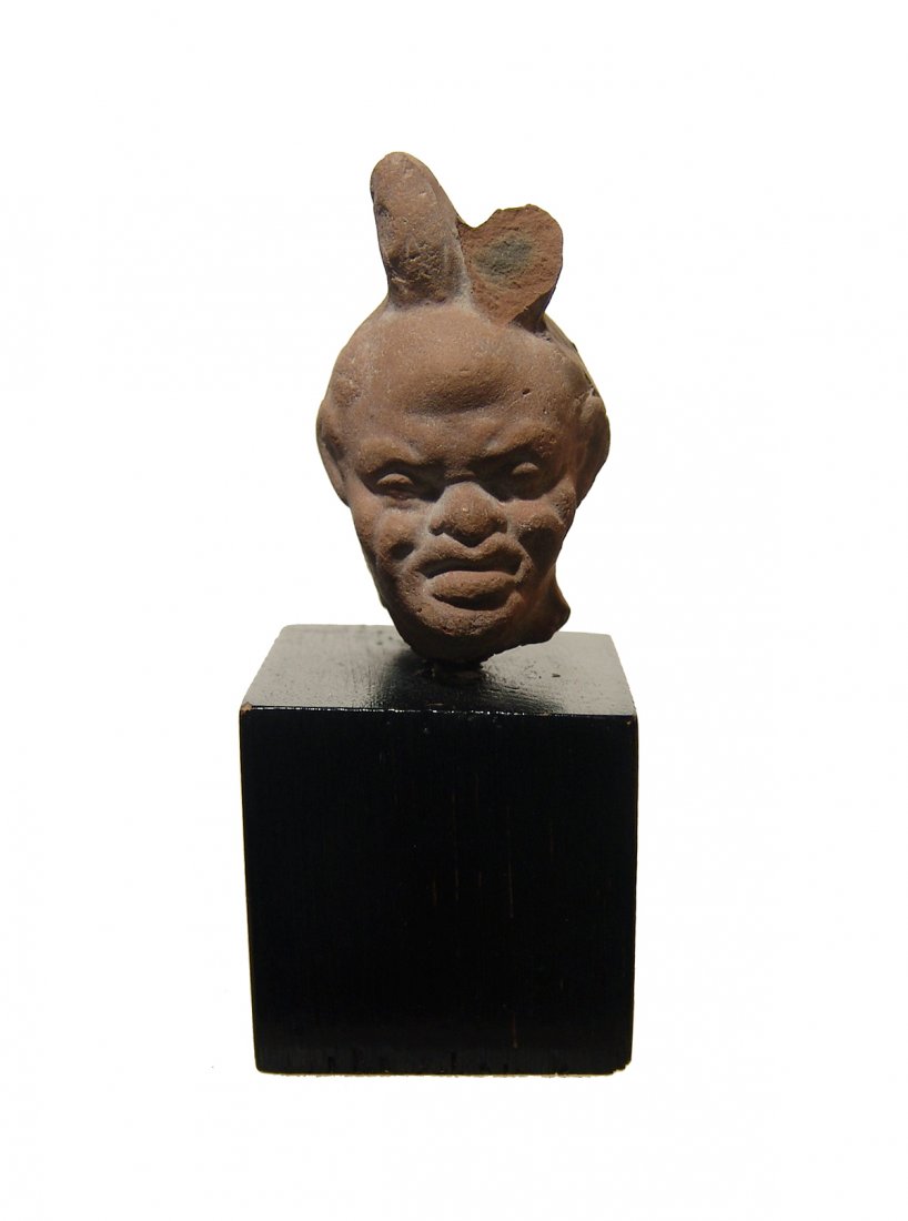 A nice Roman terracotta head of Harpokrates (1 of 4)