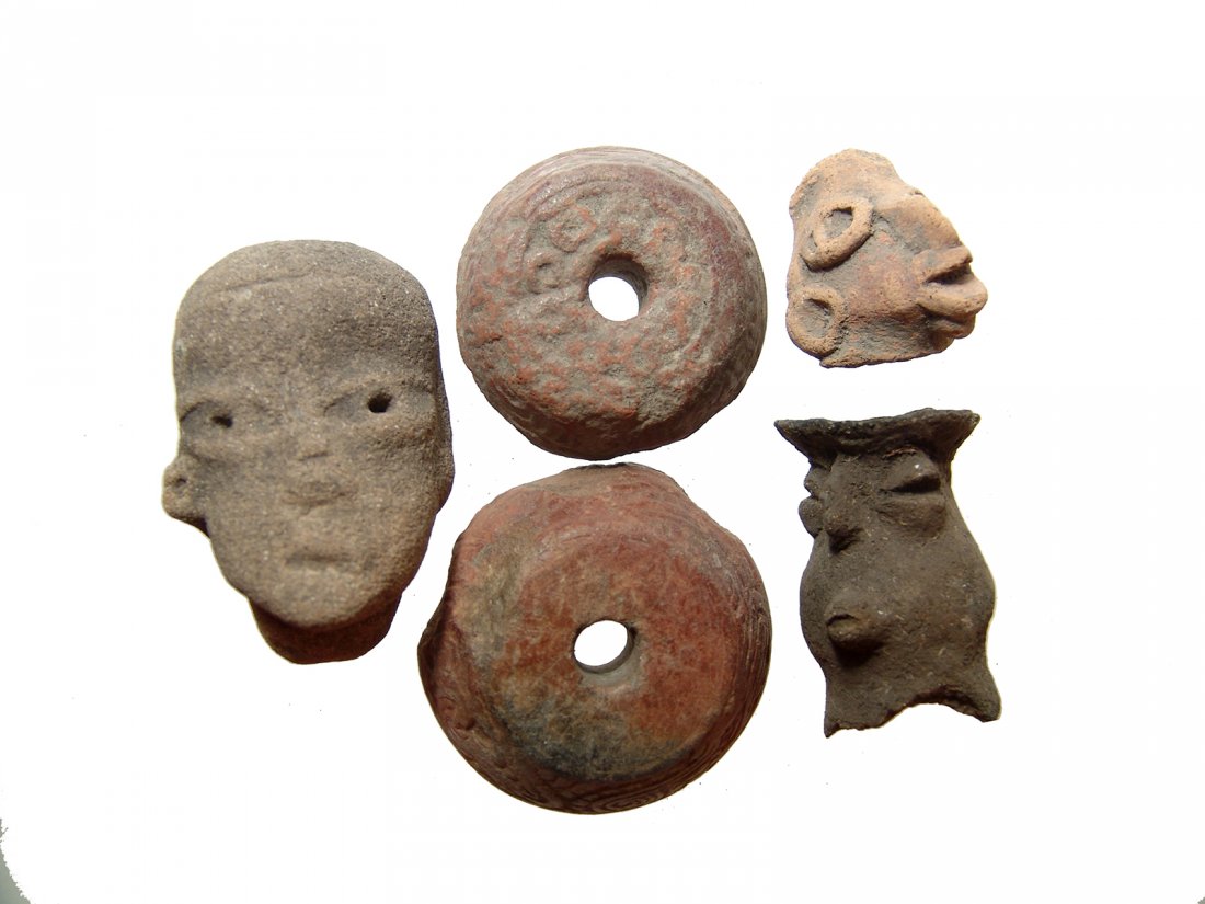A group of Pre-Columbian heads and whorls (1 of 5)