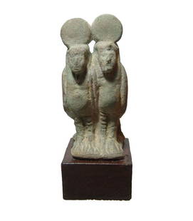 Egyptian glazed composition double Ba bird figurine: An Egyptian glazed composition double Ba bird figurine, Late Period, c. 664 - 30 BC, each in the form of a human-headed falcon with tripartite headdress surmounted by a solar disk and uraeus. A