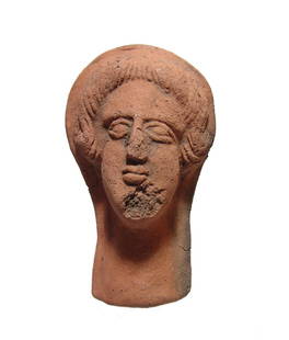 Nicely detailed Etruscan terracotta head of woman: A nicely detailed Etruscan terracotta head of woman, c. 3rd - 2nd Century BC, depicted veiled with nicely detailed facial features and great eye appeal. H: 5 2/5 in (13.7cm). Heavier and more substant