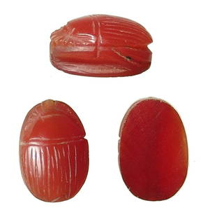 Beautiful Egyptian carnelian scarab, New Kingdom: A beautiful Egyptian carnelian scarab, New Kingdom, c. 1570 - 1075 BC, flat backed, the body detailed with incised lines on the wing case and the legs nicely carved. Holed lengthwise for suspension.