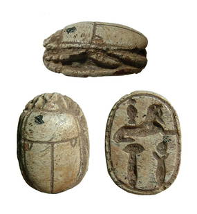 A nice Egyptian steatite scarab, Late New Kingdom: A nice Egyptian steatite scarab, Late New Kingdom, c. 1200 - 1075 BC, the body well-carved with notches on the wing cases and well-defined legs. On base there is a sphinx and it reads 'King of North