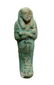 An Egyptian bicolor faience ushabti, Dynasty 21