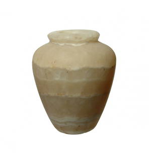 Attractive Egyptian alabaster cosmetic jar: An attractive Egyptian alabaster cosmetic jar, Early Dynastic, c. 2920 - 2575 BC, carved in beautifully banded stone, with rounded shoulders and tapered foot, the rim is wide and the interior is