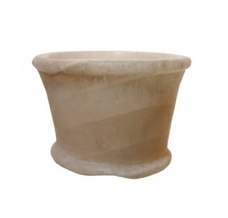 Nice Egyptian alabaster footed cup, Middle Kingdom: A nice Egyptian alabaster footed cup, Middle Kingdom, c. 1975 - 1640 BC, with wide foot, slightly tapered walls and rounded rim. Carved from a light colored banded alabaster and quite nice. 2 1/4 x 3