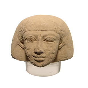 Egyptian sandstone canopic jar lid representing Imsety: A choice Egyptian sandstone canopic jar lid representing Imsety, New Kingdom, c. 1570 - 1075 BC, wearing wide feathered wig, his facial features well cut in fine style. Imsety was one of the Four