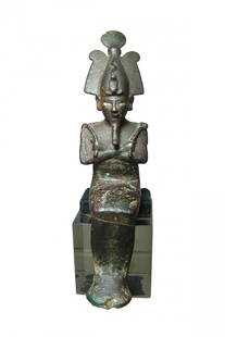 A fantastic Egyptian bronze figure of seated Osiris: A fantastic Egyptian bronze figure of seated Osiris, Late Period, 26th Dynasty, 664 - 525 BC, retaining inlaid eyes. The god of the underworld is depicted seated mummiform, wearing Atef crown with