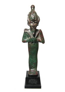 Egyptian bronze Osiris with silver inlaid eye remnants: A wonderful Egyptian bronze figure of Osiris with remnants of silver inlaid eyes, Late Period, c. 664 - 343 BC, depicted mummiform wearing Atef crown with uraeus and false beard, arms folded at