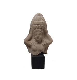 A Roman-Egyptian terracotta bust of a woman: A Roman-Egyptian terracotta bust of a woman, c. 1st - 2nd Century AD, wearing braided wig with curls over her shoulders and supporting a basket of fruit above her head. 4 1/8 in x 2 7/8 in (10.6 x