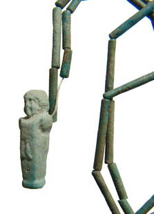 Egyptian faience beaded necklace with rare herm amulet: A strand of Egyptian faience tube bead with rare Herm amulet, Late Period, c. 664 - 30 BC, the beads a turquoise color and the amulet in the form of a Greek Herm, a male head atop a pillar with male