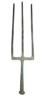 A massive Hellenistic bronze trident: A massive Hellenistic bronze trident, c. 3rd - 1st Century BC, of heavy construction with three long tines, each with rectangular profile and rounded tips. The shaft widens toward base and is