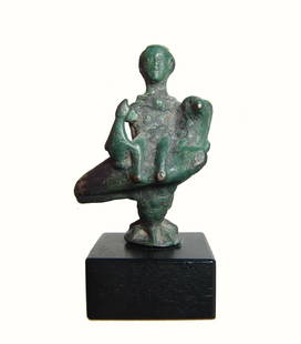 Roman bronze figurine of Mercury seated on an eagle: A Roman bronze figurine of Mercury seated sideways on an eagle, c. 2nd Century AD, wearing a winged petasos and a chlamys and holding a purse. His features are nicely detailed and overall an