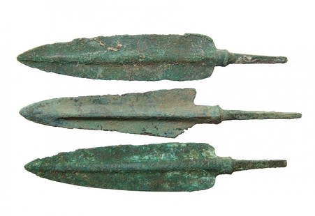 A lot of 3 nice Near Eastern bronze arrow points: A lot of 3 nice Near Eastern bronze arrow points, c. 1200 - 800 BC, each with pronounced midrib and tapered blade, the stems are quite substantial for mounting into the shaft. Largest 5 3/8 in (13.7 c