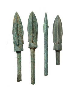 4 Chinese bronze arrow or ballista points, Qin Dynasty: A group of 4 Chinese bronze arrow or ballista points, Qin Dynasty, c. 255 - 206 BC, each trilobate with long tangs. L: 2 5/8 in (6.8 cm). Ex Boston private collection.