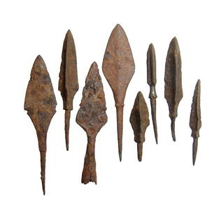 8 Chinese iron points, Liao to Qing Dynasty: A group of 8 Chinese iron points, Liao to Qing Dynasty, c. AD 916 - 1125, mixed types including bladed as well as trilobate types with preserved tangs. Longest 3 7/8 in (9.8 cm). Oxide patination. Ex