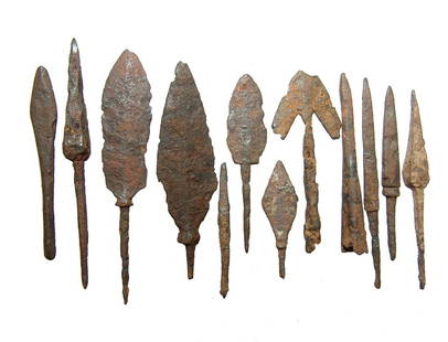 12 Chinese iron points, Liao to Qing Dynasty: A group of 12 Chinese iron points, Liao to Qing Dynasty, c. AD 916 - 1125, mixed types including bladed, trilobate and armor piercing with preserved tangs. Longest 3 3/4 in (9.5 cm). Oxide