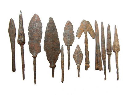 12 Chinese iron points, Liao to Qing Dynasty: A group of 12 Chinese iron points, Liao to Qing Dynasty, c. AD 916 - 1125, mixed types including bladed, trilobate and armor piercing with preserved tangs. Longest 3 3/4 in (9.5 cm). Oxide