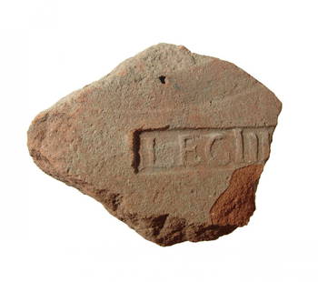 Roman roof tile with stamp of Legion IV: A Roman roof tile with stamp of Legion IV, likely Legio IIII Flavia Felix, c. 1st - 3rd Century AD. The rectangular stamp is missing the left side, but the remaining letters which read LEG III…