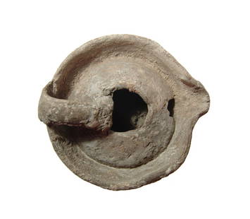 An Islamic ceramic lamp from the Holy Land: An Islamic ceramic lamp from the Holy Land, c. 9th - 11th Century, bowl-shaped with domed shoulders around fill-hole, pinched spout and single loop handle. L: 3 1/2 in (9.5 cm). Moderate surface