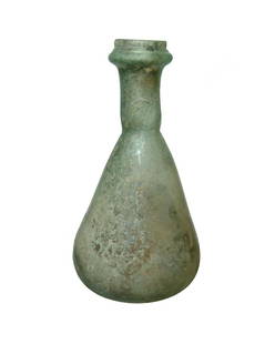 A large Roman pale blue-green glass bottle: A large Roman pale blue-green glass bottle, c. 3rd - 4th Century AD, the body bell-shaped with lightly indented base, the short tubular neck with rounded ridge just below the vertical rim, used for