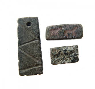 A group of three Levantine stone seals: A group of three Levantine stone seals. The first is a banded steatite prism, c. 1st Millennium BC, with a nicely carved standing woman wearing chiton and himation, the opposite side with pseudo