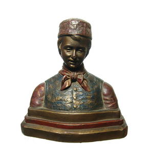 A bronze clad polychromed Dutch boy bookend: A bronze clad polychromed Dutch boy bookend, 1920's - 1930's, from the Armor Bronze Co New York. Well preserved. 7 x 6 3/4 in (17.8 x 17.2 cm).